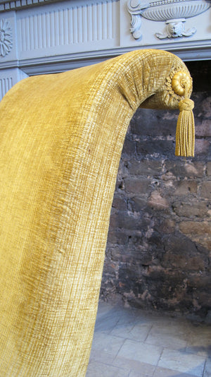 Pair of french 19th century chairs with sweeping backs and tassel detail
