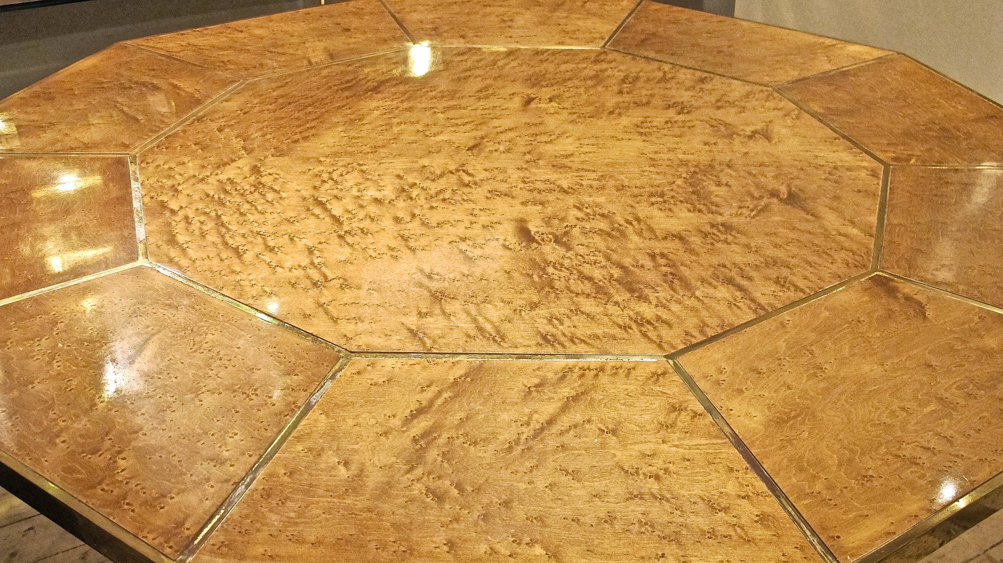 X A 1970s maple and bronze framed dinning table in the style of Willy Rizzo.