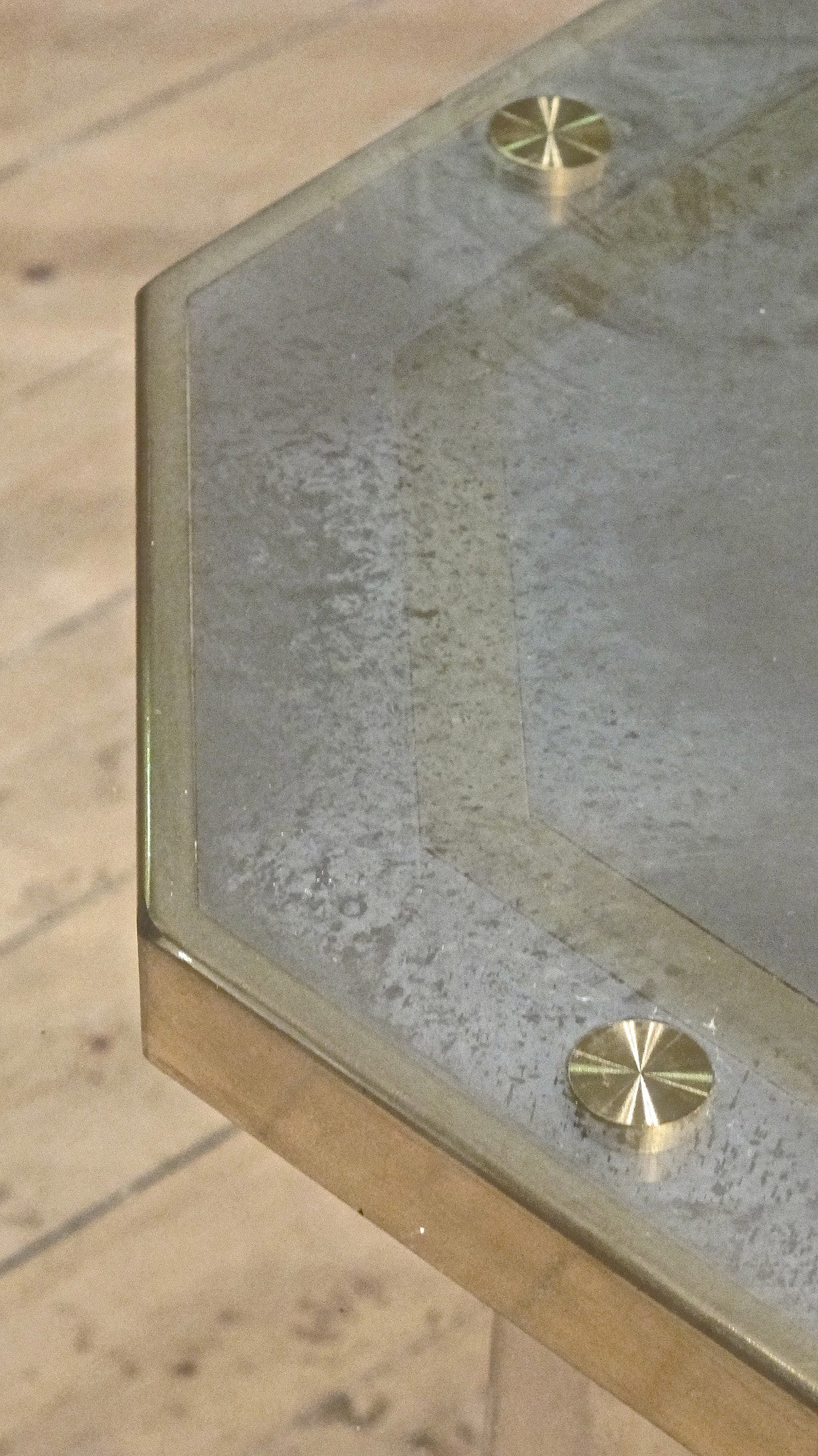 X A steel brass and glass 1970s centre table .