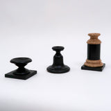 Ebonised, hand turned wood display base.