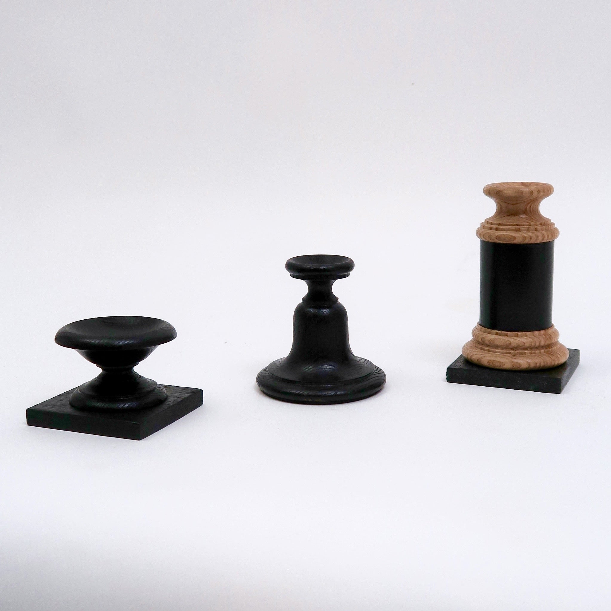 Ebonised, hand turned wood display base.