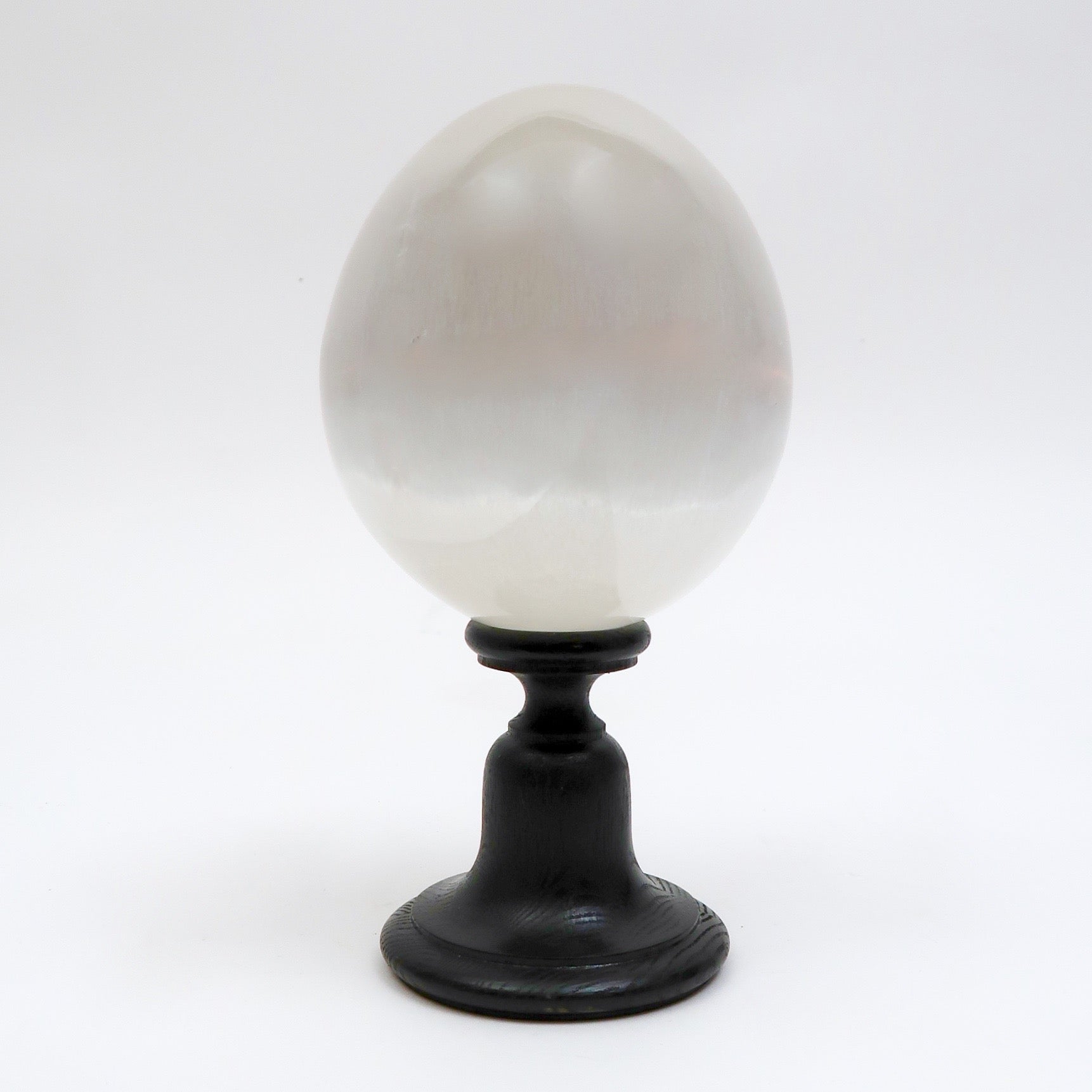 Hand turned and ebonised wood display stand.