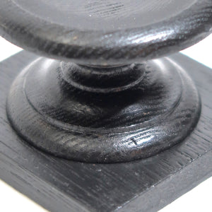 Hand turned and ebonised wood display stand.