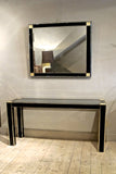 X A superb quality black lacquer console and mirror with solid brass trim and mother of pearl corner details.