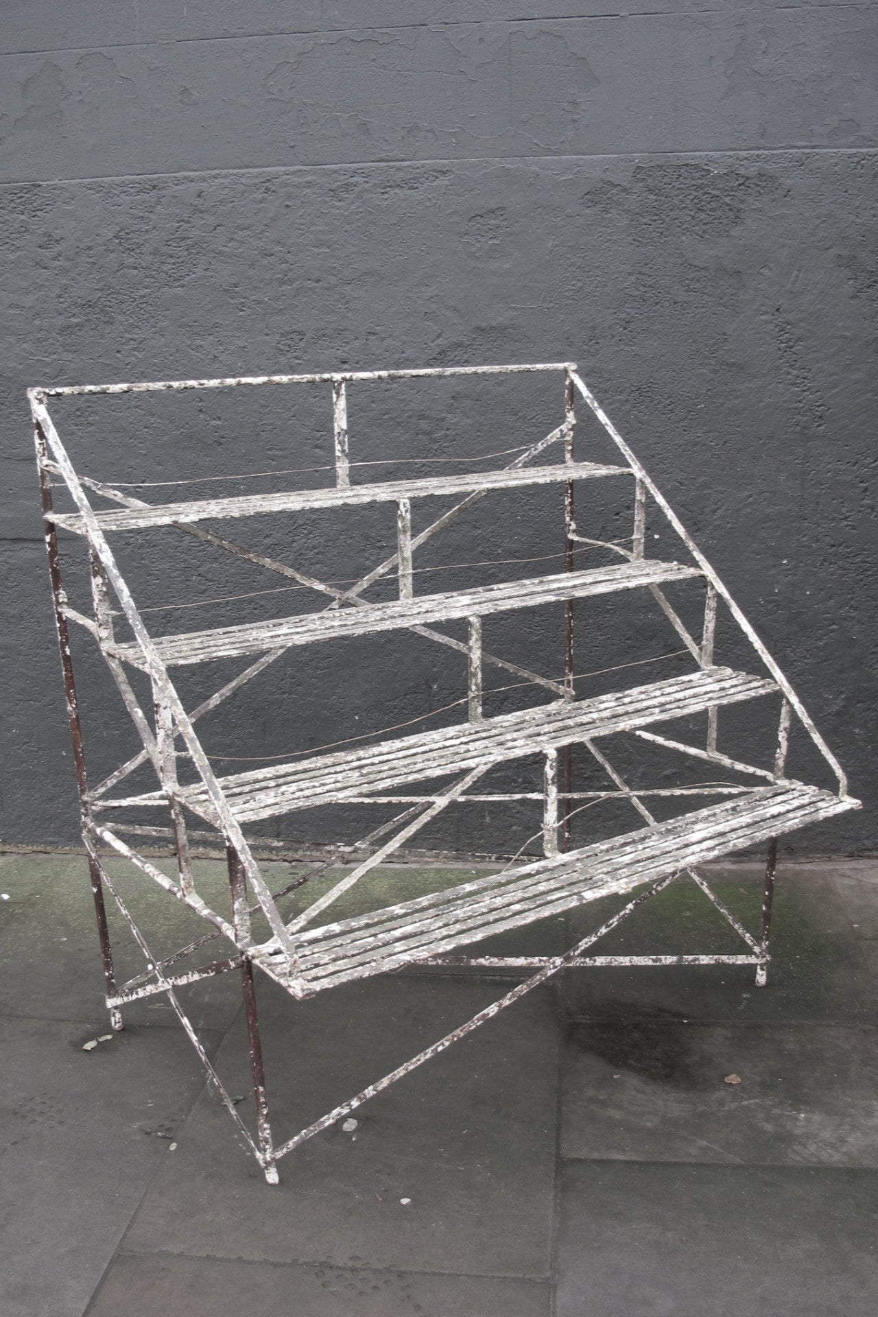 X Early twentieth century country house orangery plant stand in original paint finish.
