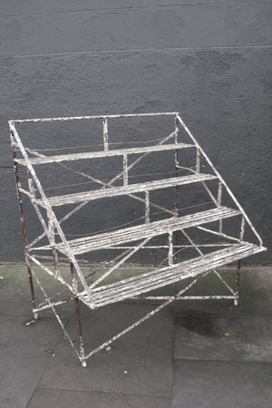 X Early twentieth century country house orangery plant stand in original paint finish.