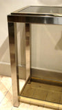 A 1970s brass and chrome console of petite size.