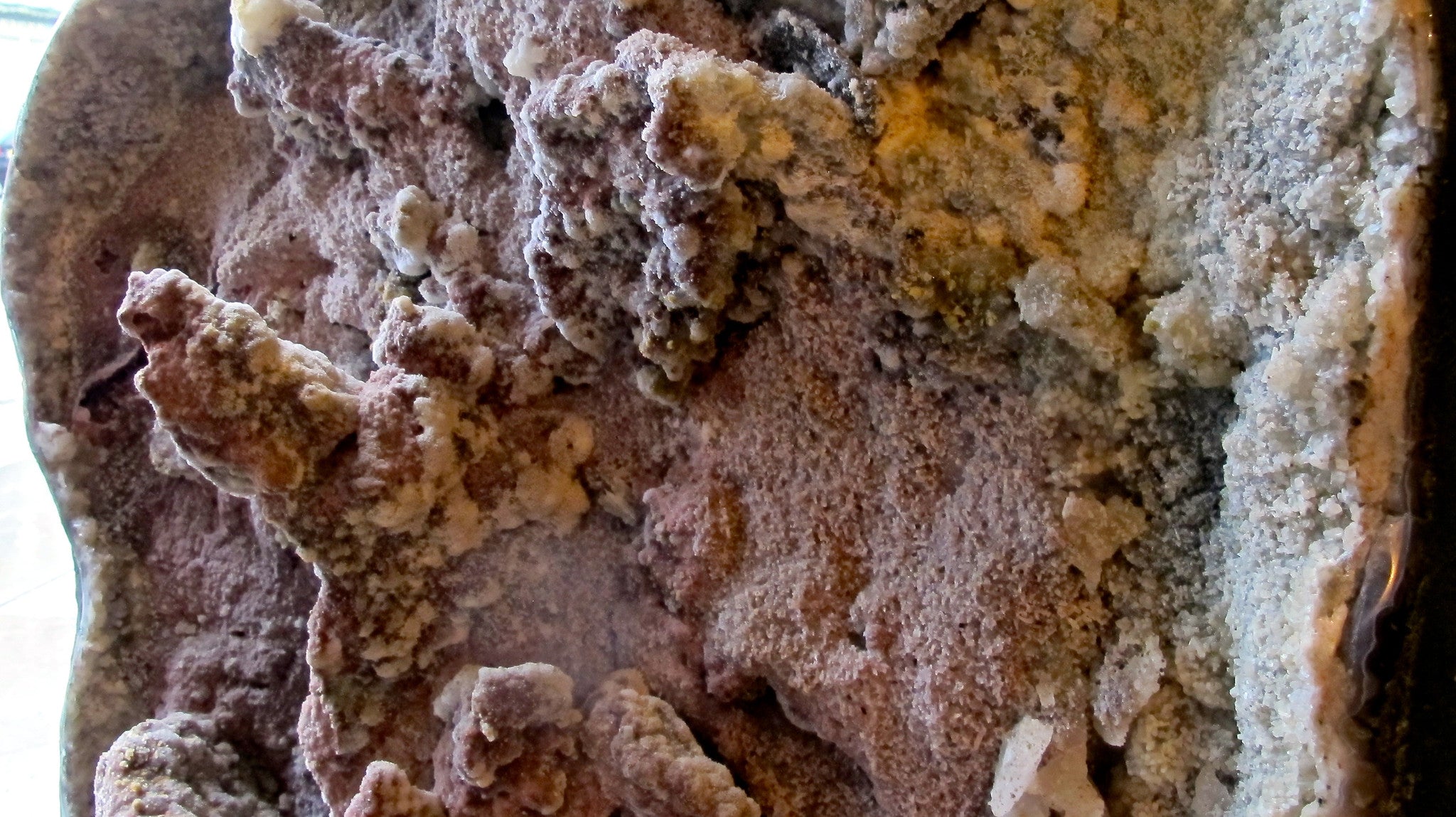 X Very large and rare Brazilian floor standing geode with unpolished formations of amethyst and quartz.