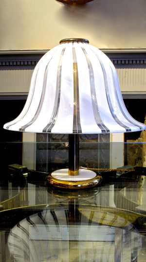 X A brass and striped glass 1970s Murano table lamp.