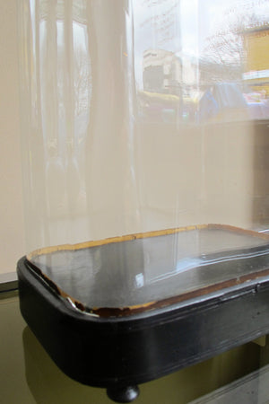 Large selection of empty antique glass domes available .