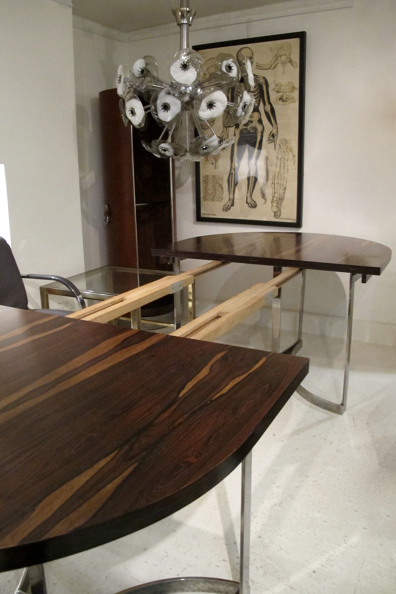 X Exceptional , extending, Merrow Associates Rosewood and Chrome Dinning Table Designed by Richard Young.