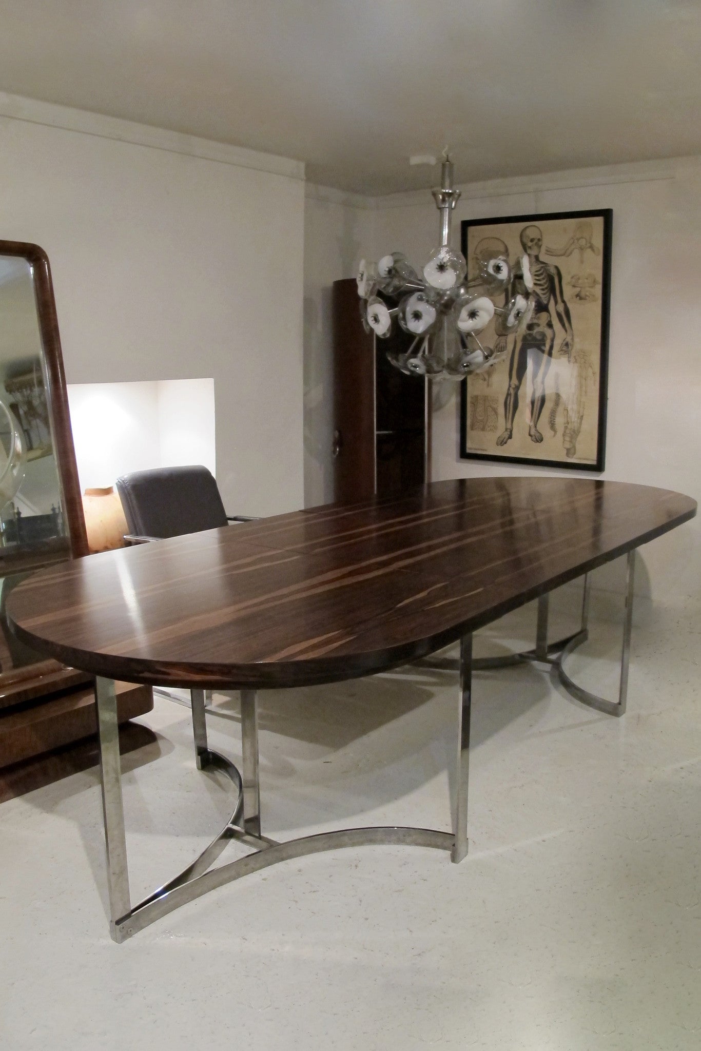 X Exceptional , extending, Merrow Associates Rosewood and Chrome Dinning Table Designed by Richard Young.