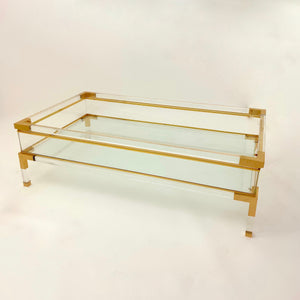 Vintage French perspex and brass coffee table with sliding top .