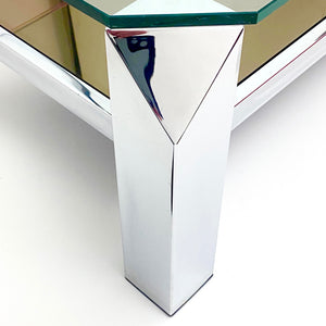 Vintage modernist 2 tier chrome coffee table with canted corners .