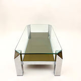 Vintage modernist 2 tier chrome coffee table with canted corners .