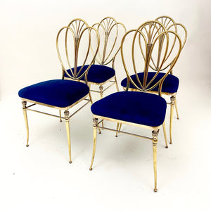 Very stylish set of 4 vintage brass dinning chairs .