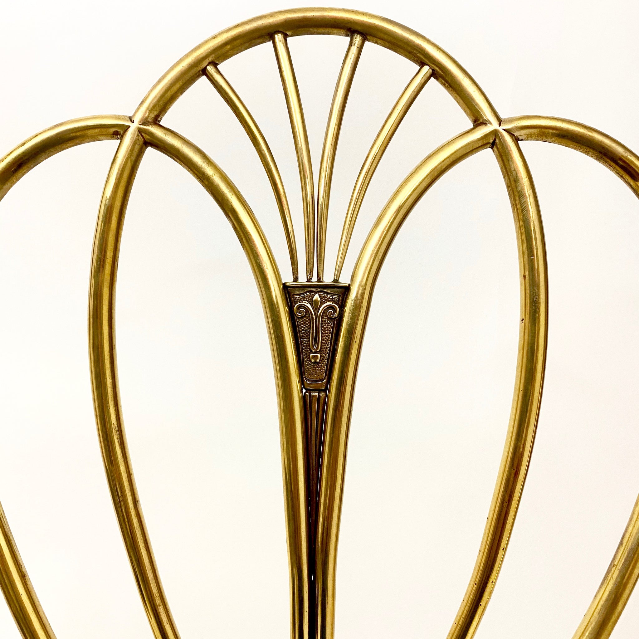 Very stylish set of 4 vintage brass dinning chairs .