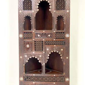 Highly decorative early 20th century corner cabinet.