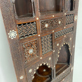 Highly decorative early 20th century corner cabinet.