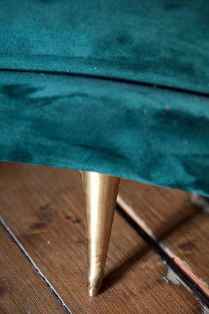 Italian curved 50's style sofa newly upholstered in green velvet.