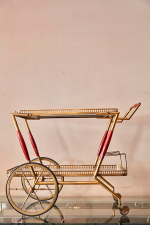 Whimsical Italian 1950's brass trolley with bar accesories.