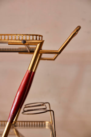 Whimsical Italian 1950's brass trolley with bar accesories.