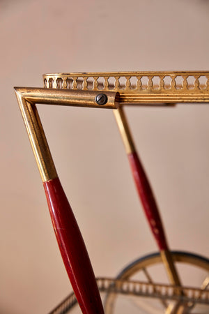 Whimsical Italian 1950's brass trolley with bar accesories.