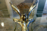 X Brass Coffee Table With stylised base featuring 3 birds, with a bevelled glass top.