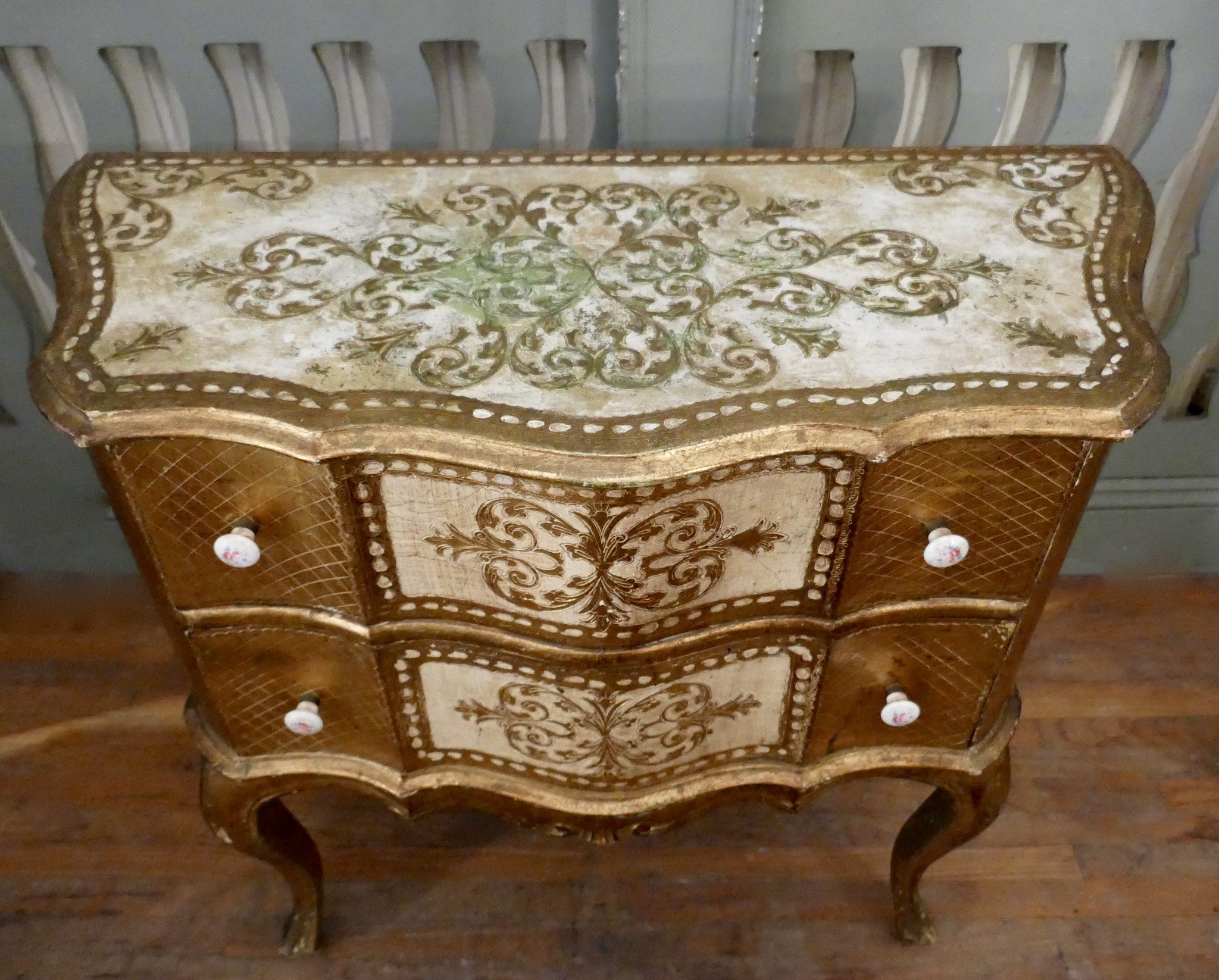 X Serpentine fronted Florentine chest of drawers.