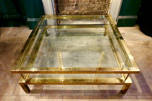 Brass coffee table with sliding top circa 1970in the Maison Jansen style.