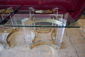 Decorative pair of 1970's lucite and brass side tables