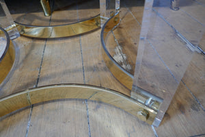 Decorative pair of 1970's lucite and brass side tables