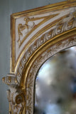 A large Louis XV style  parcel gilt over mantel mirror, 19th Century .