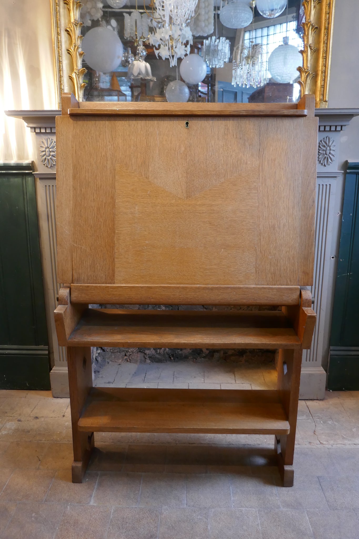 Beatifully designed and executed 1950's French fold down oak desk . Designer unknown.
