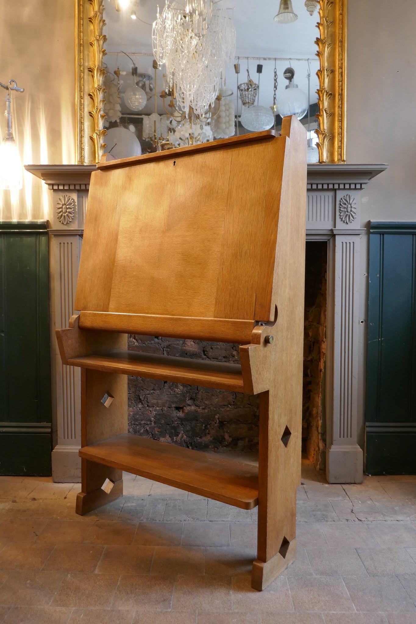 Beatifully designed and executed 1950's French fold down oak desk . Designer unknown.