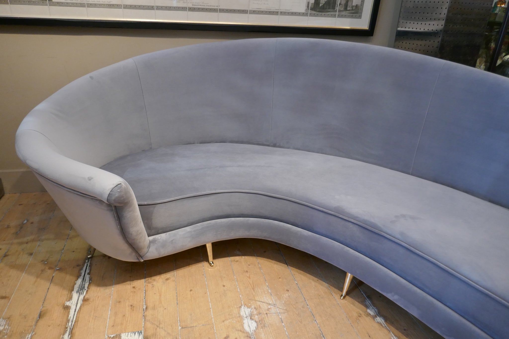 Curved Italian sofa 1960's style  upholstered in grey velvet .