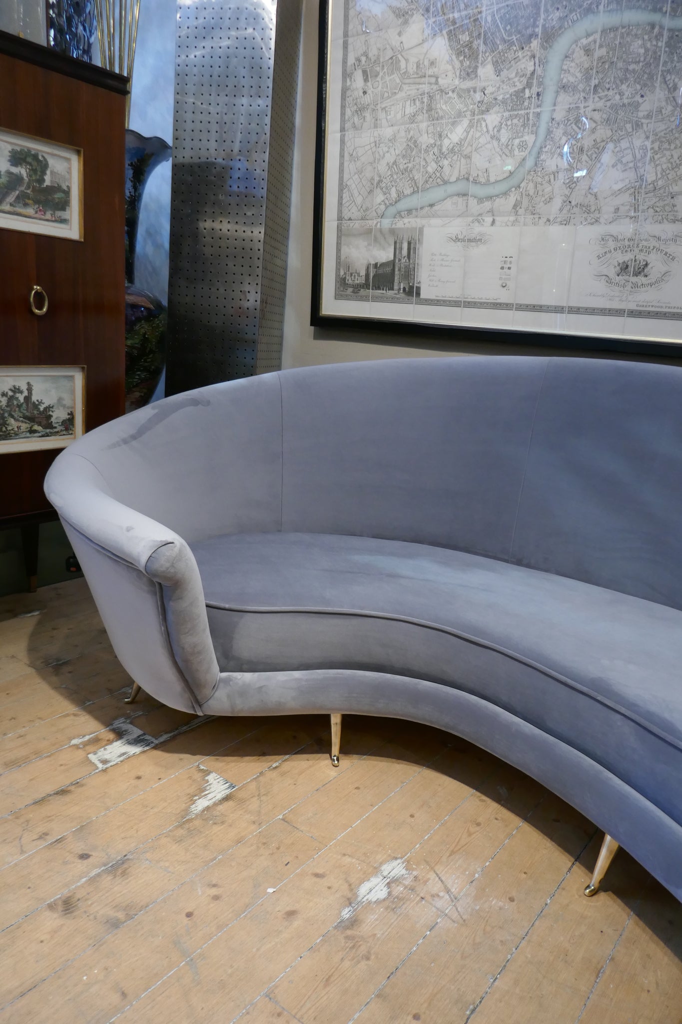 Curved Italian sofa 1960's style  upholstered in grey velvet .