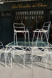 Decorative french 1950's garden table and six chairs.