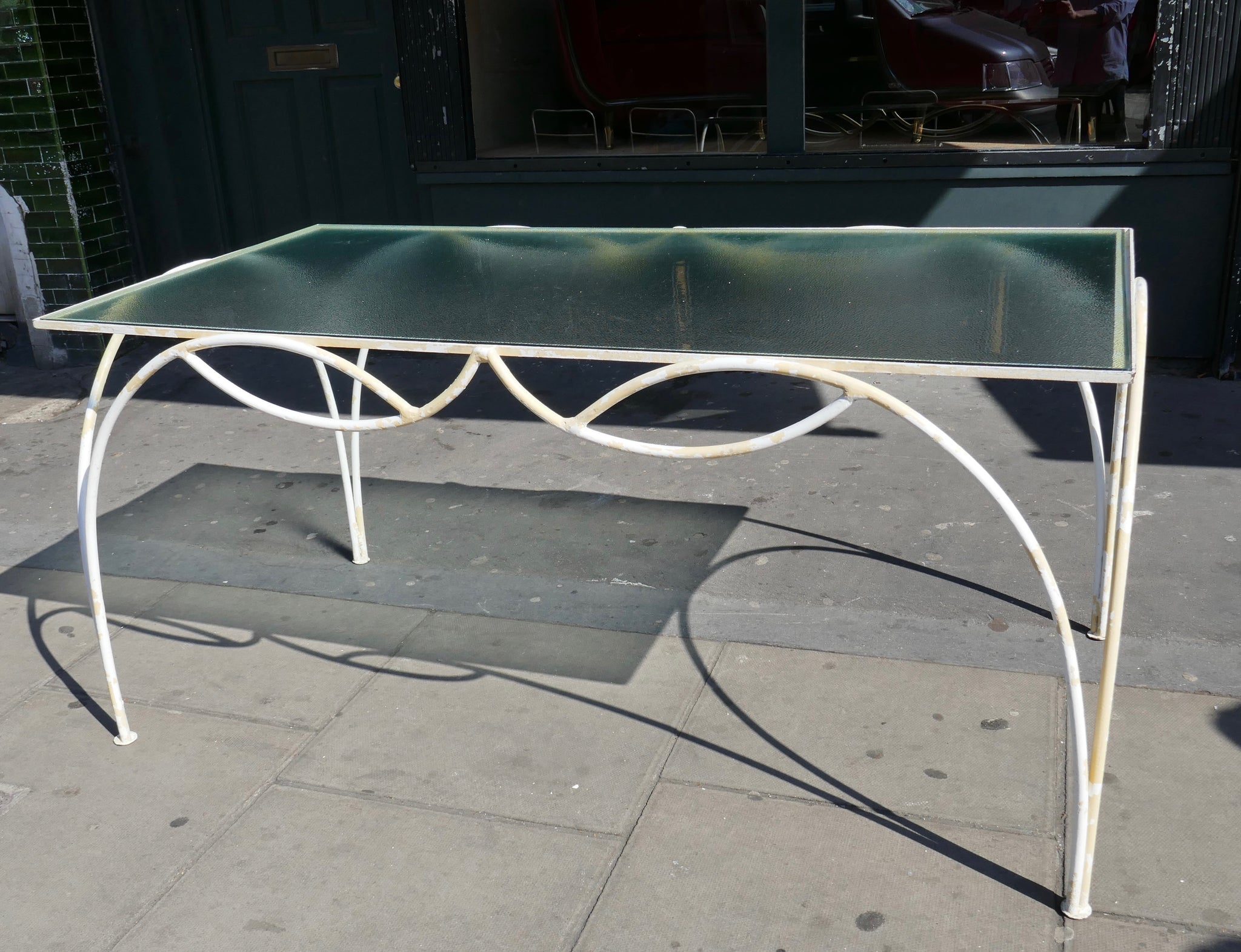 Decorative french 1950's garden table and six chairs.