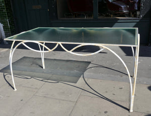 Decorative french 1950's garden table and six chairs.