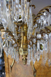 Gilt bronze Viennese palm chandelier circa 1900 designed by Joseph Hoffman and manufactured by Balkalowits . With decorative original chain and ceiling plate.