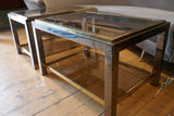 Pair of 1970's chrome and gold side tables in the manner of Willy Rizzo.