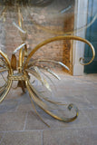 Large 1950's Italian wheatsheaf table with bevelled glass top .