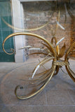 Large 1950's Italian wheatsheaf table with bevelled glass top .