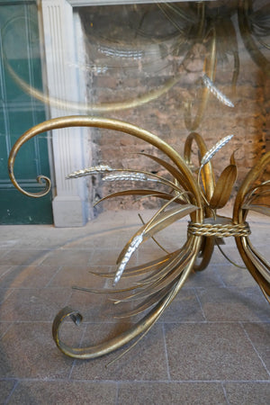 Large 1950's Italian wheatsheaf table with bevelled glass top .