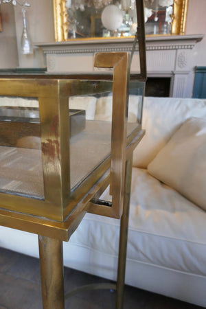 Fabulous quality french brass display cabinet with lift up top and securing side bars circa 1900.