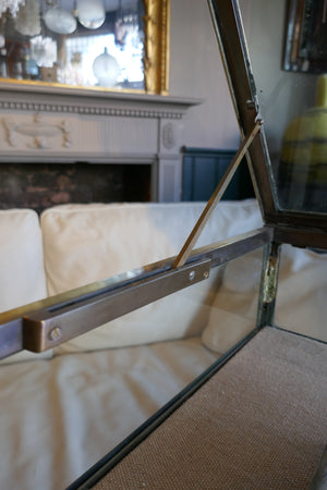 Fabulous quality french brass display cabinet with lift up top and securing side bars circa 1900.