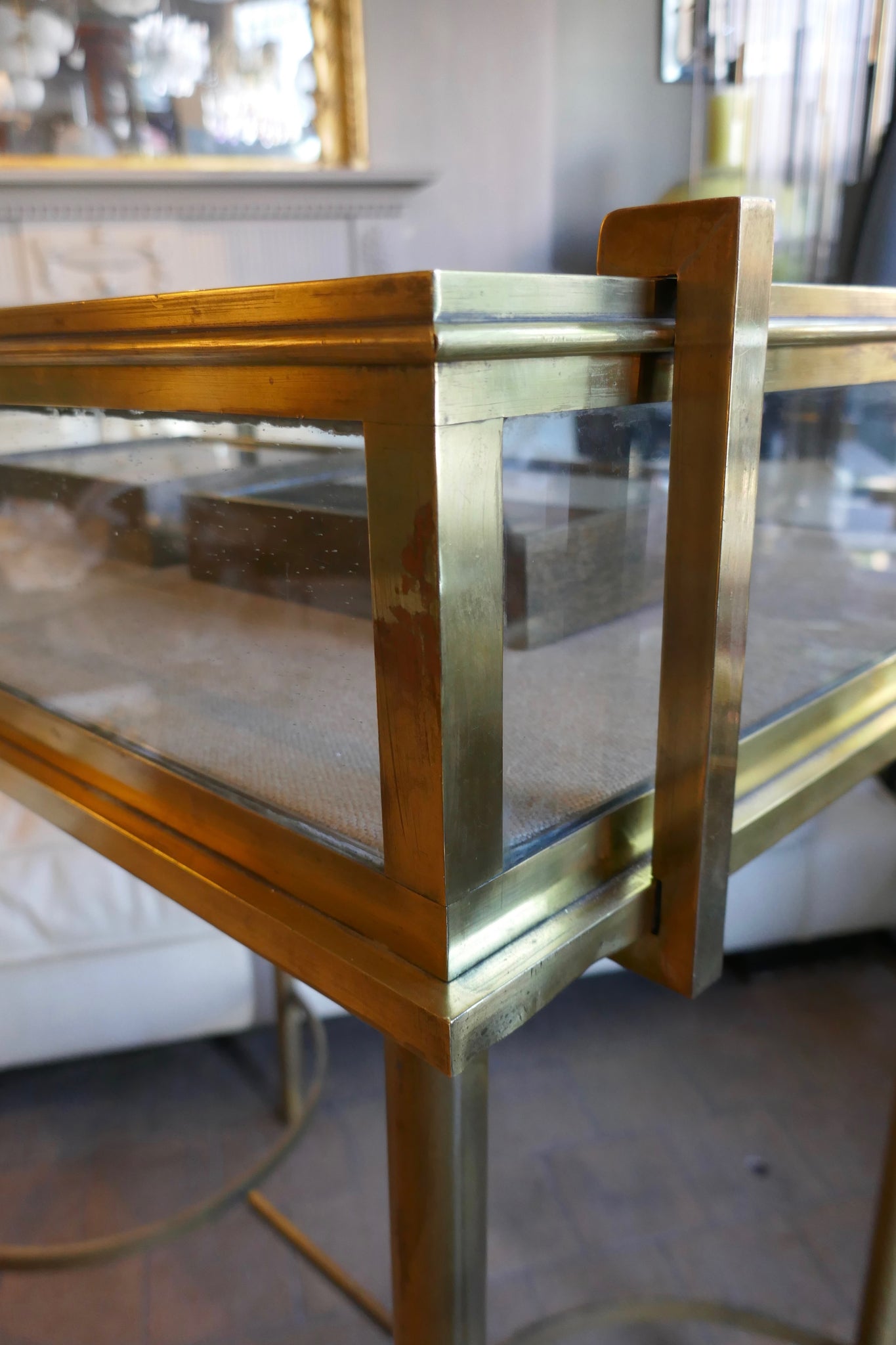 Fabulous quality french brass display cabinet with lift up top and securing side bars circa 1900.