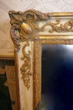 Highly decorative french mirror with original parcel gilt finish and original glass.