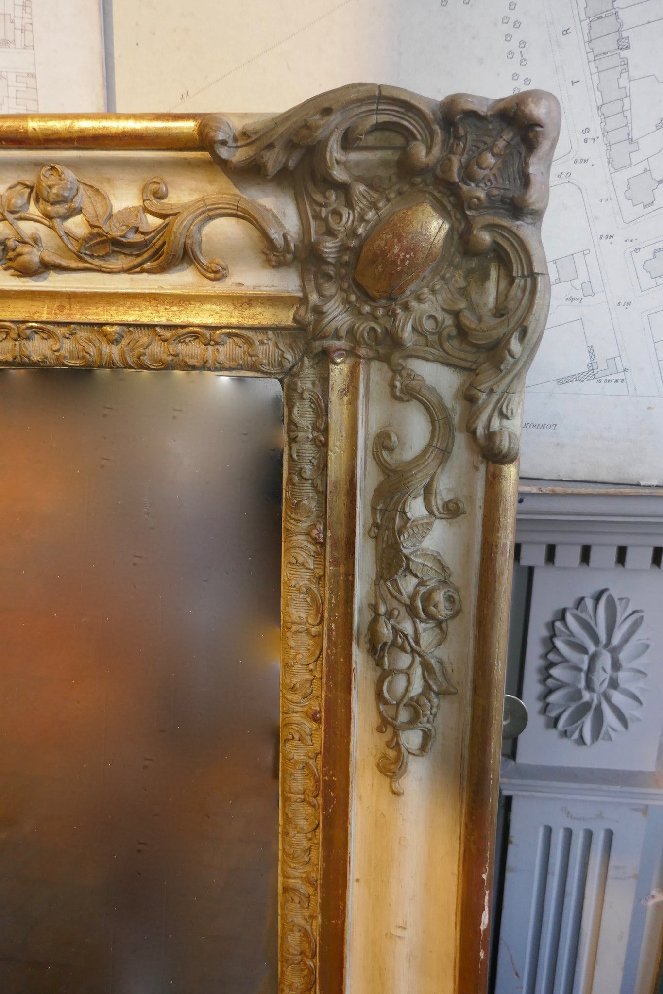 Highly decorative french mirror with original parcel gilt finish and original glass.